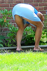 Upskirt milfs - flashed in her garden